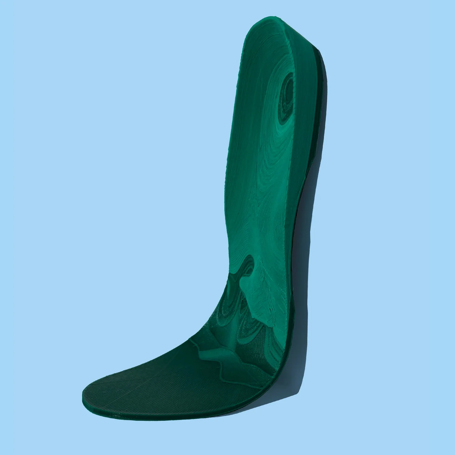 Ridgeline custom orthotic — full-length, flexed to show strength