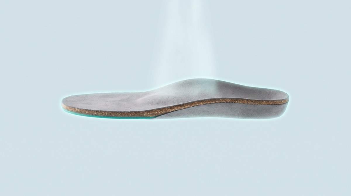 Custom orthotic arch profile — lower back alignment
